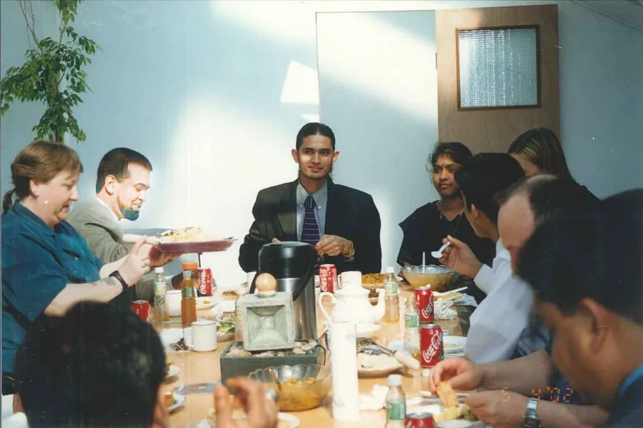 The first web development team at a shared meal, late 1990s.